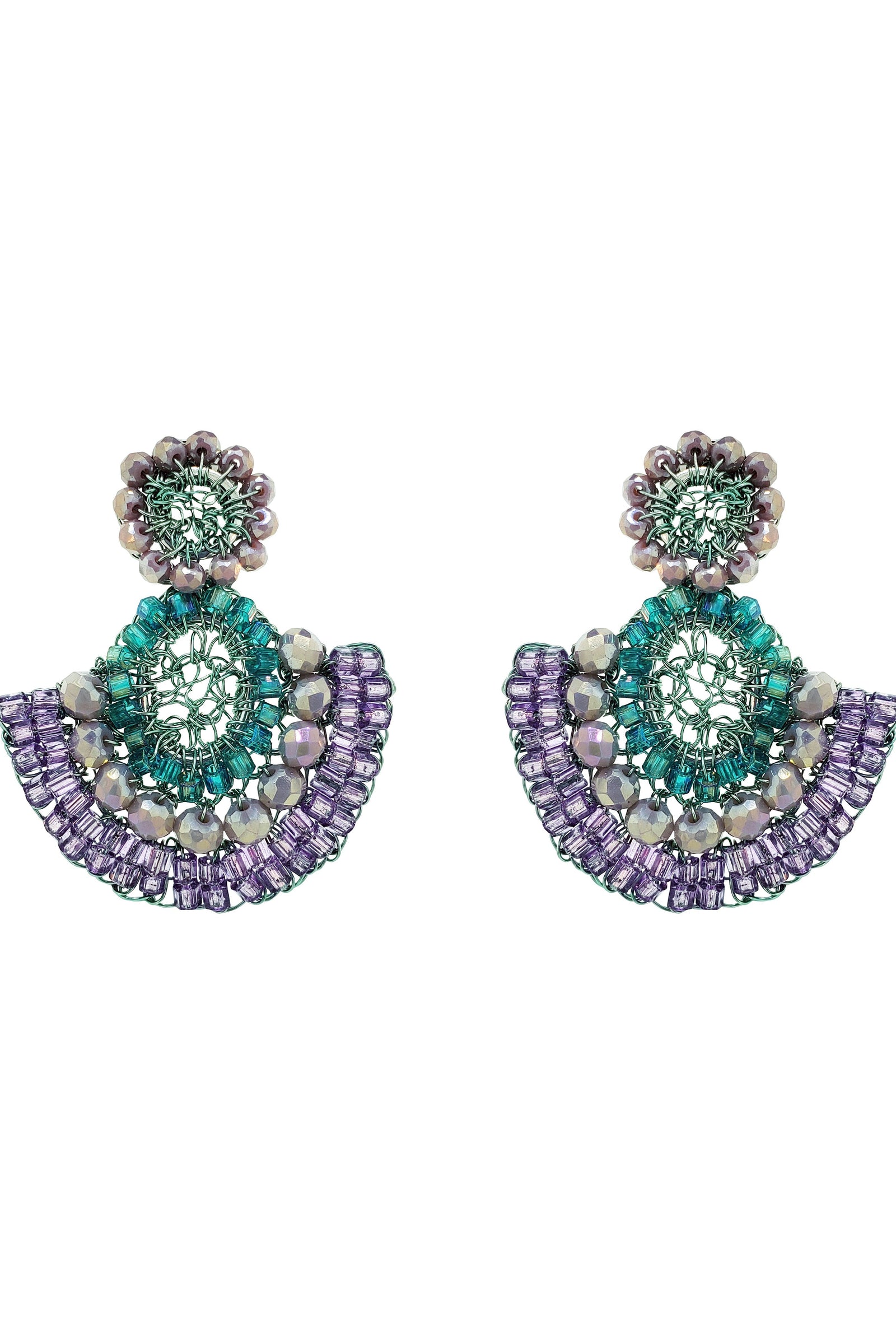 Pair of earrings with green and purple gemstones on a white background