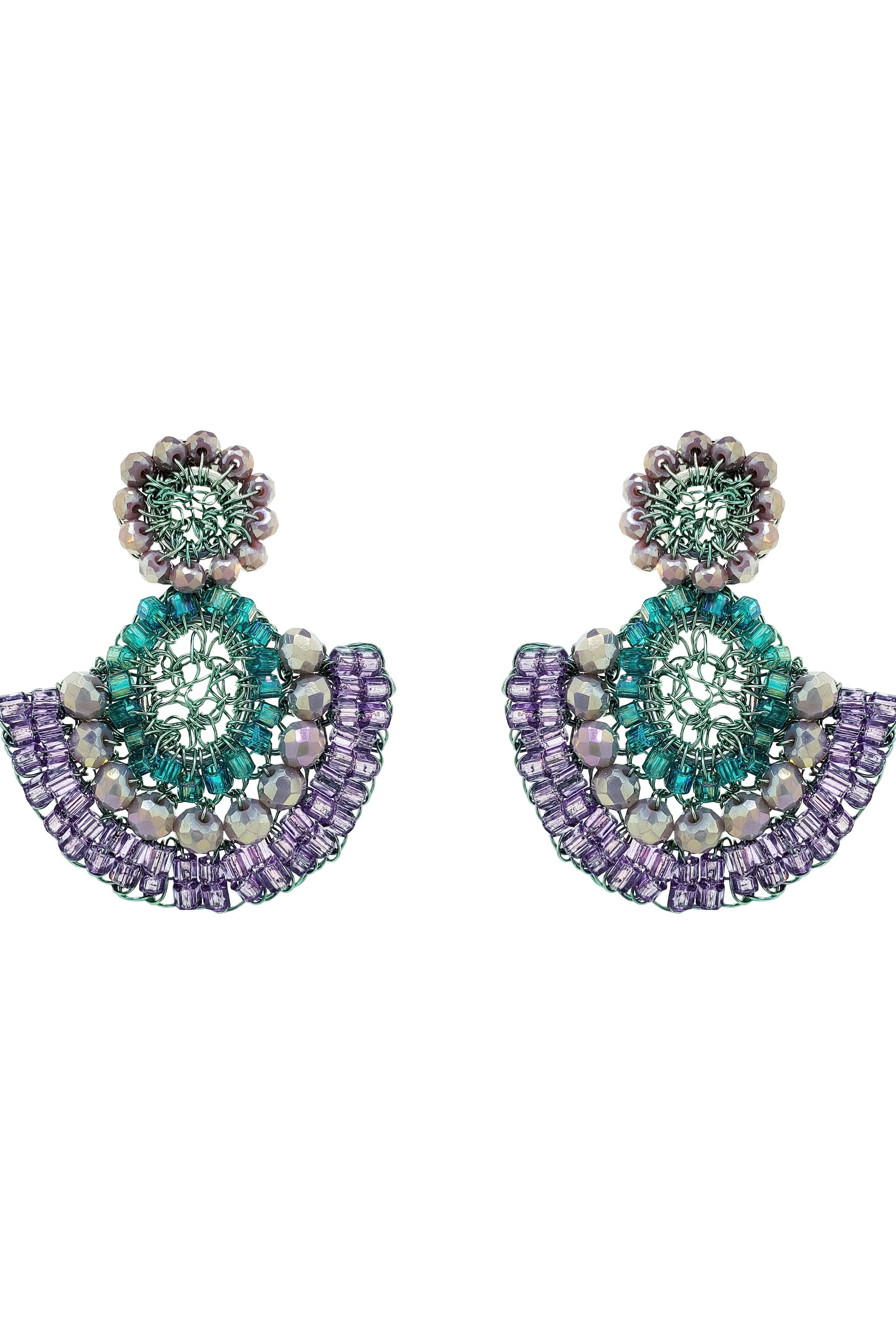 Pair of earrings with green and purple gemstones on a white background
