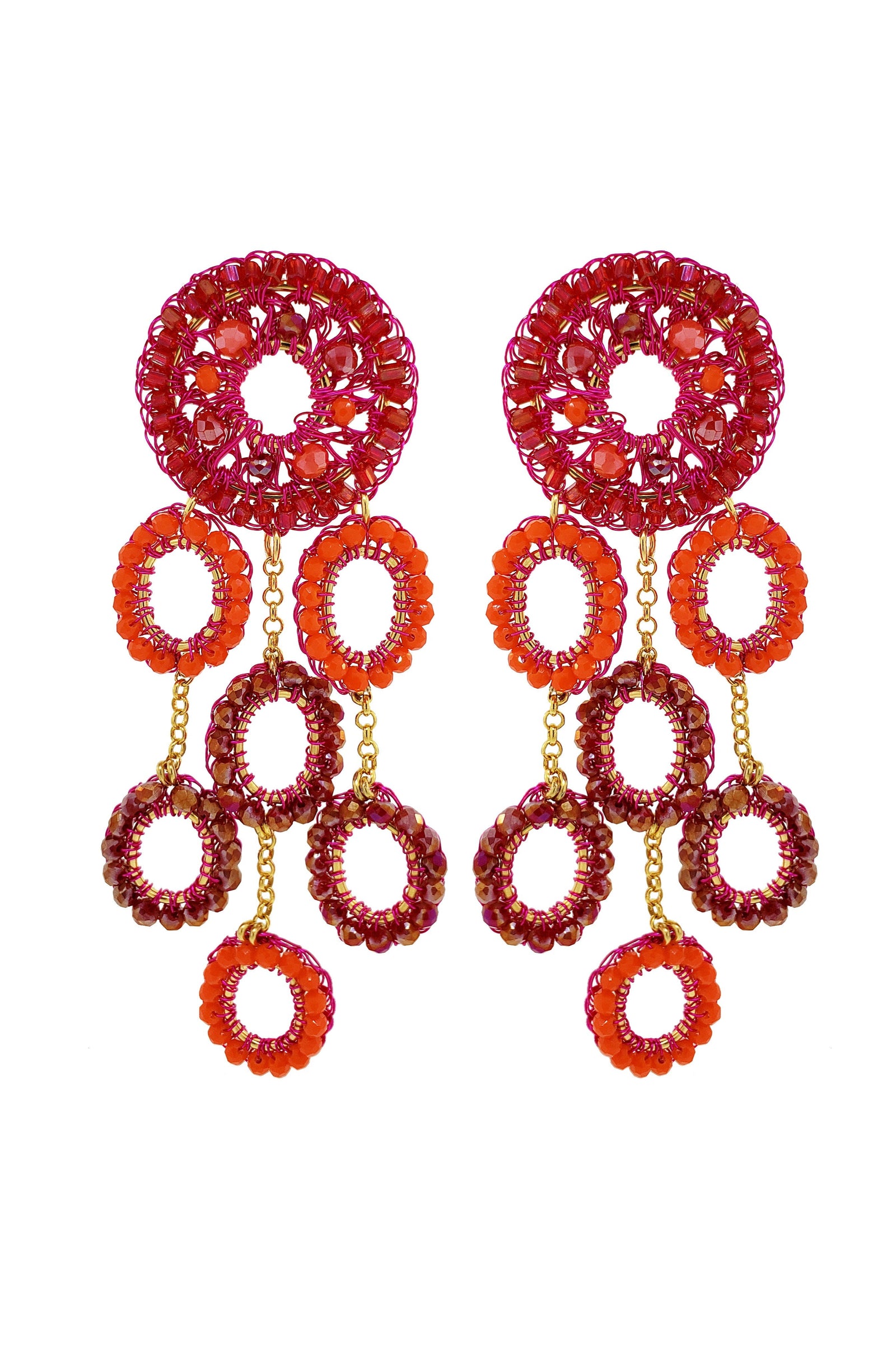 Pair of red and orange beaded earrings on a white background