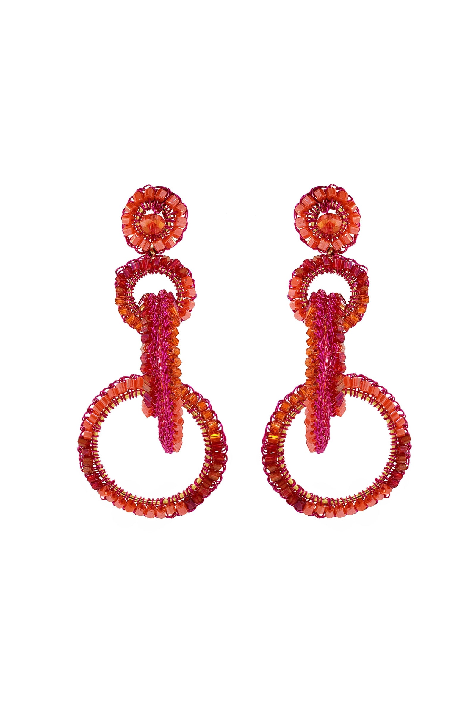 Pair of red beaded earrings on a white background