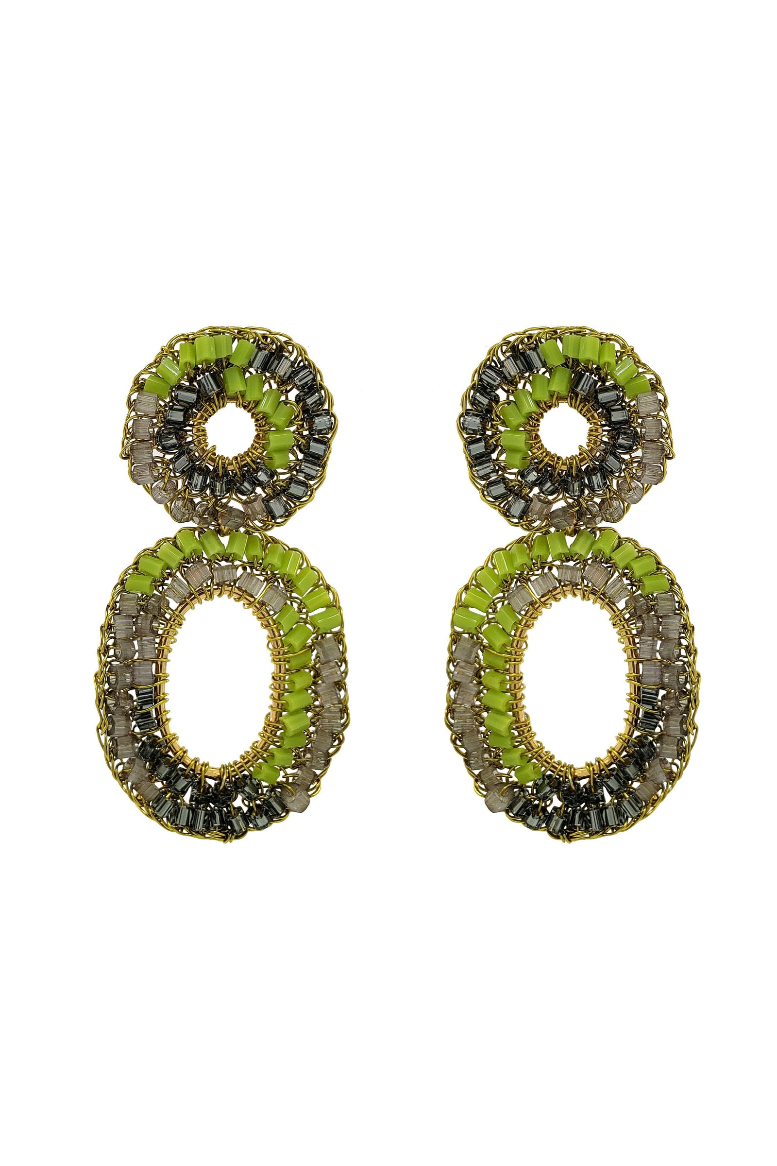 Pair of earrings with green and black gemstones on a white background