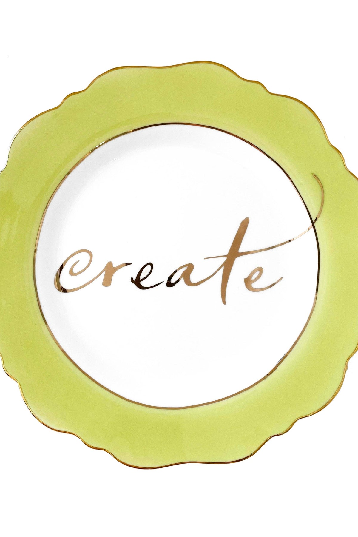 Round green plate with 'create' text on a white background