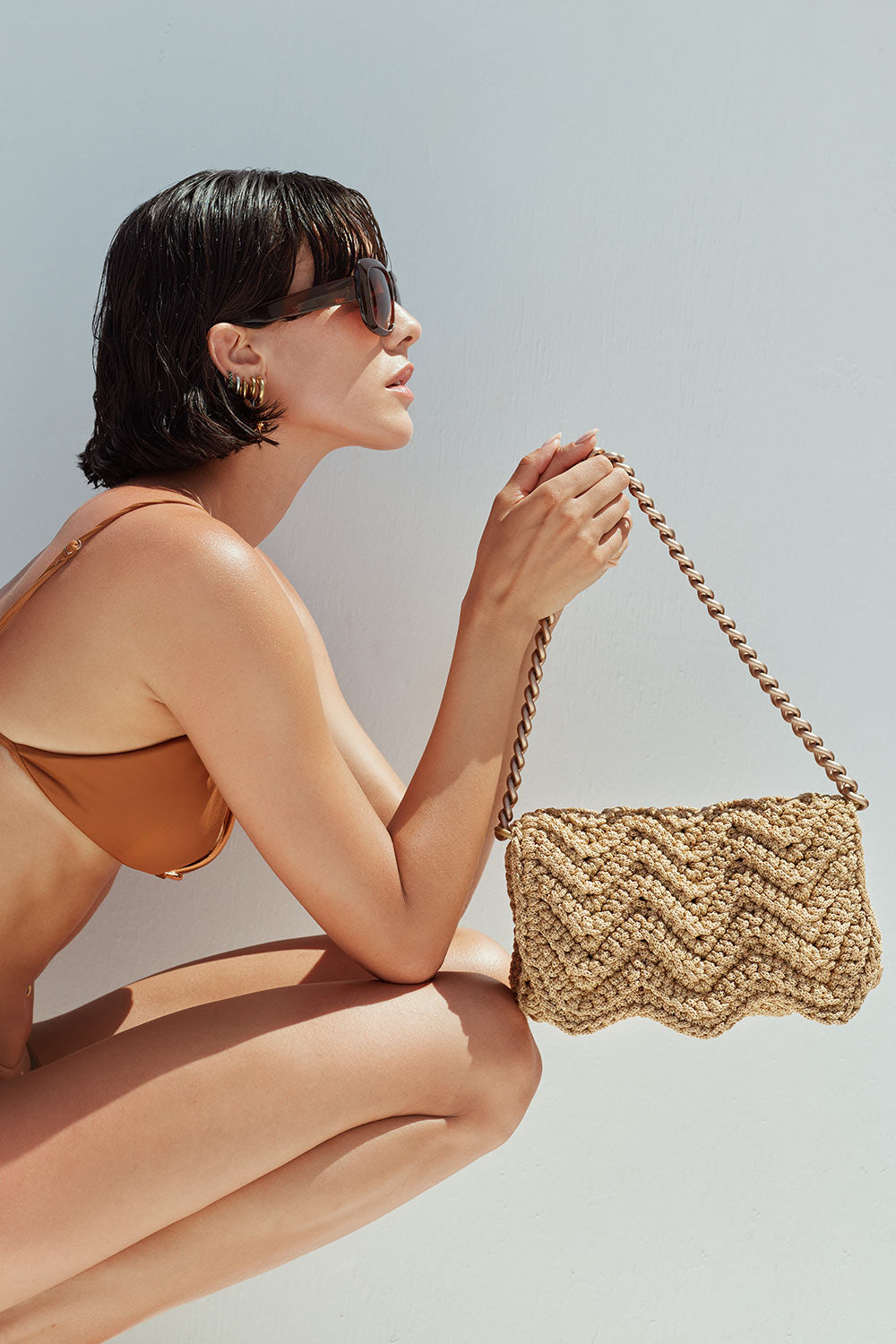 Lulu crochet wave clutch
