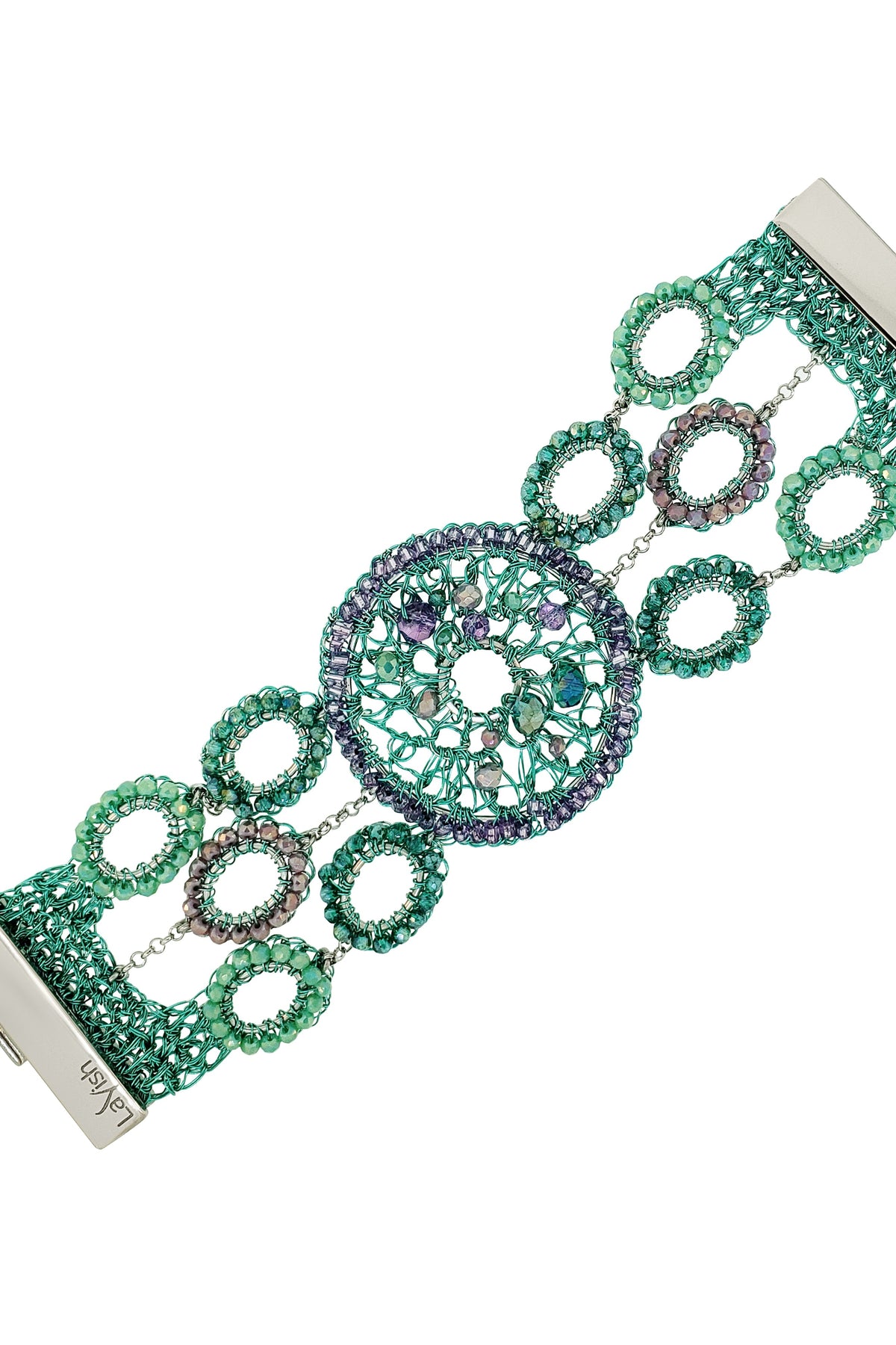 Decorative bracelet with green and silver design on a white background