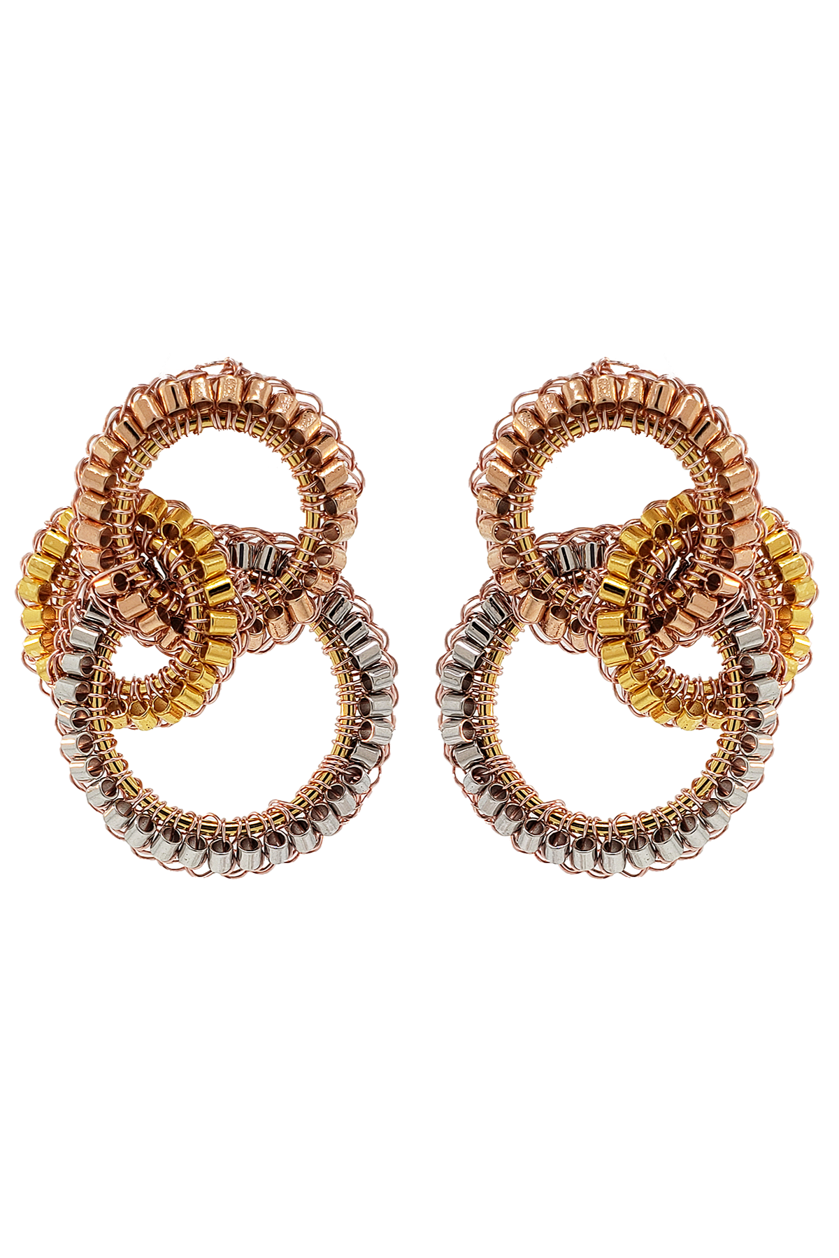Pair of gold and rose gold earrings on a white background