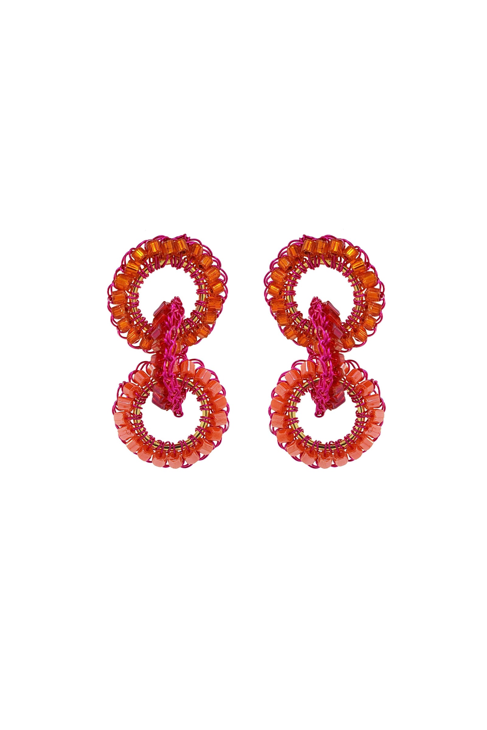 Pair of red beaded earrings on a white background