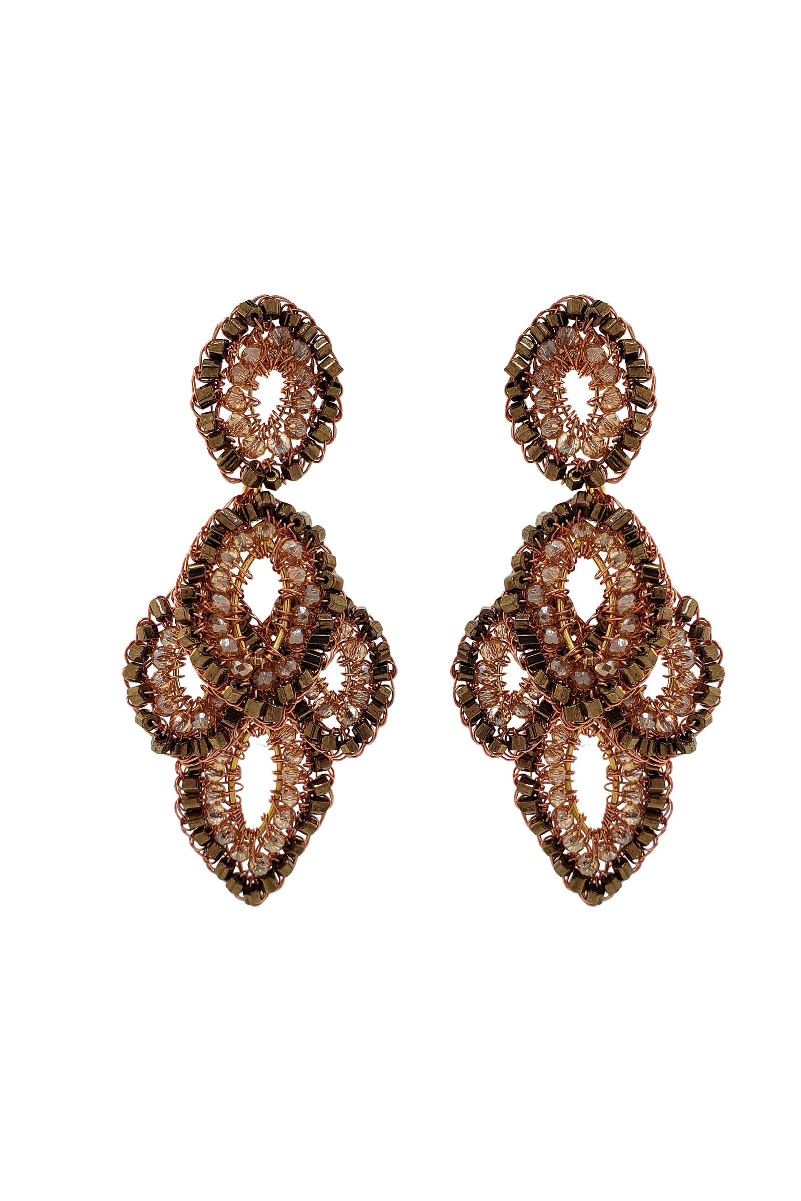 Pair of rose gold earrings on a white background