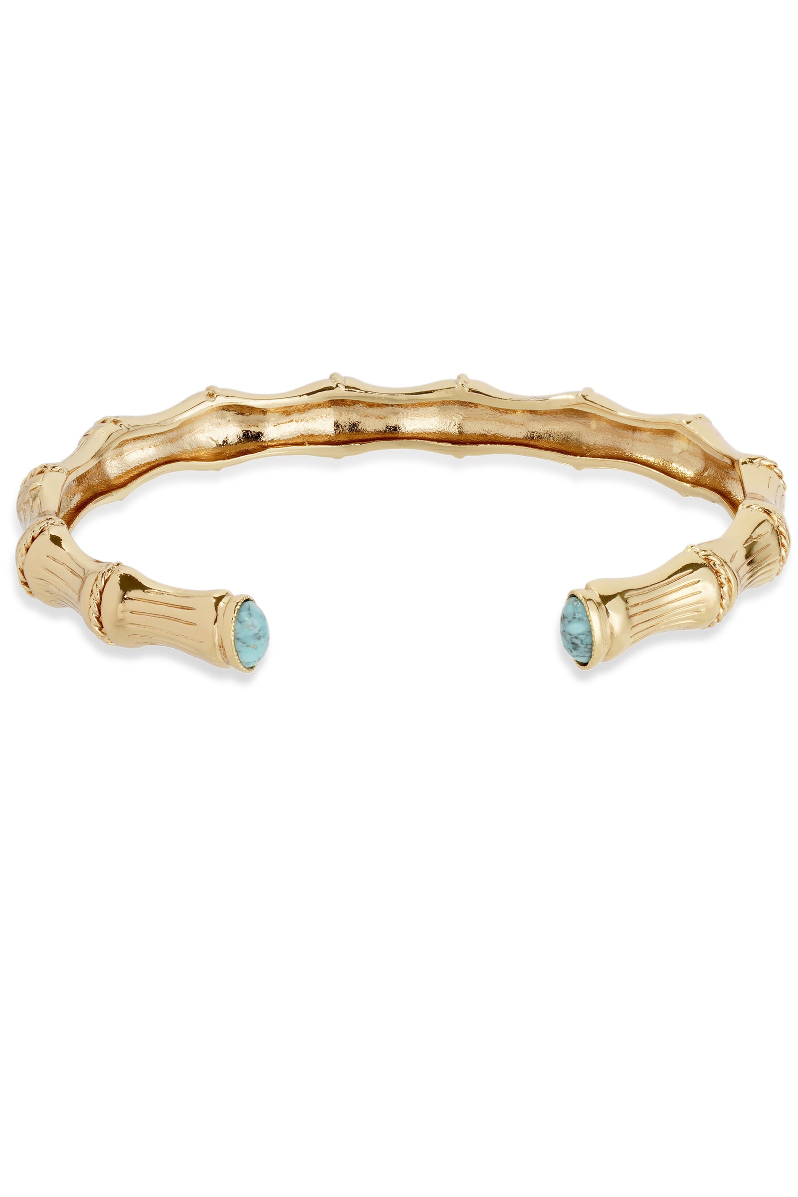 Gold bracelet with turquoise stones on a white background