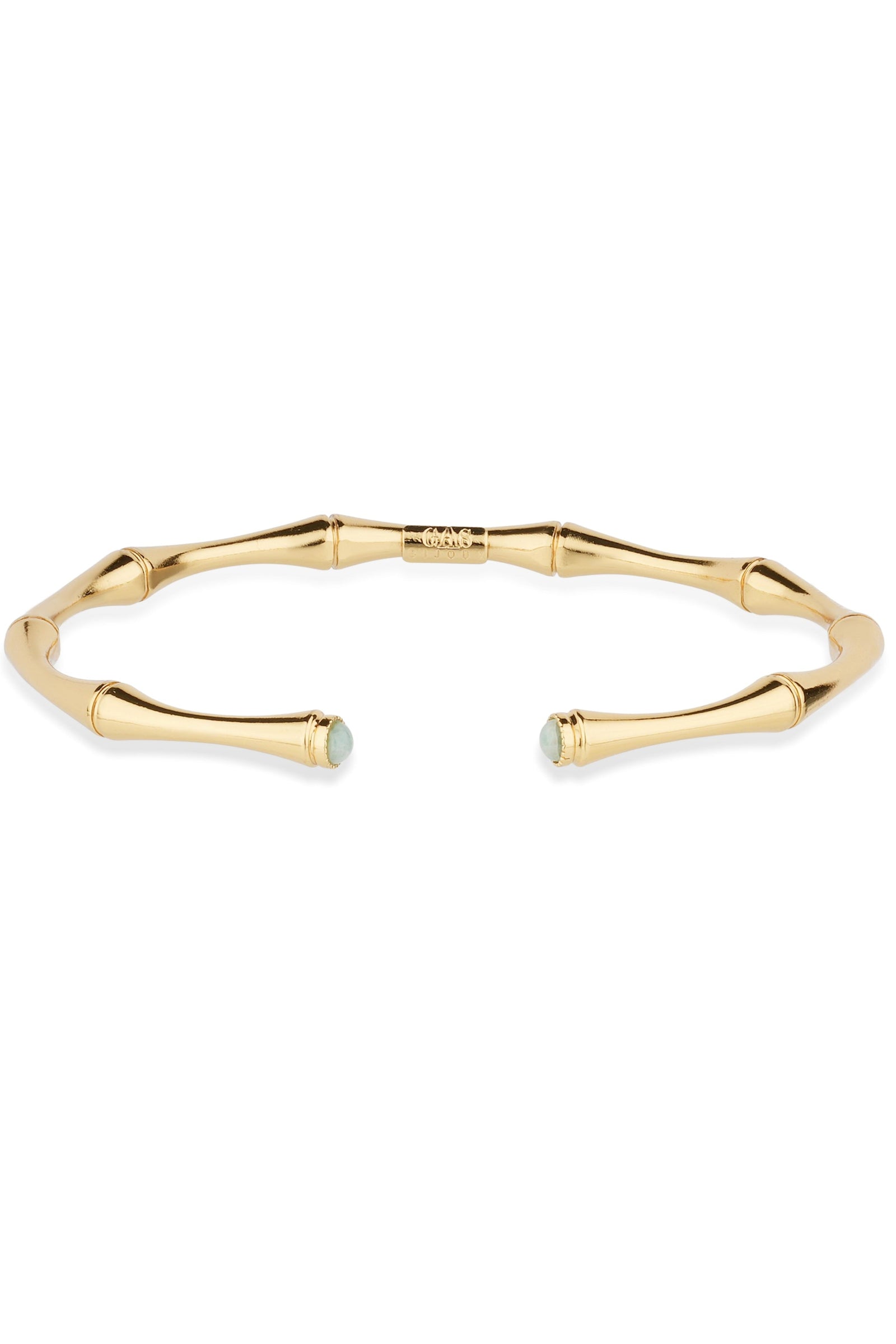 Gold bracelet on a white background