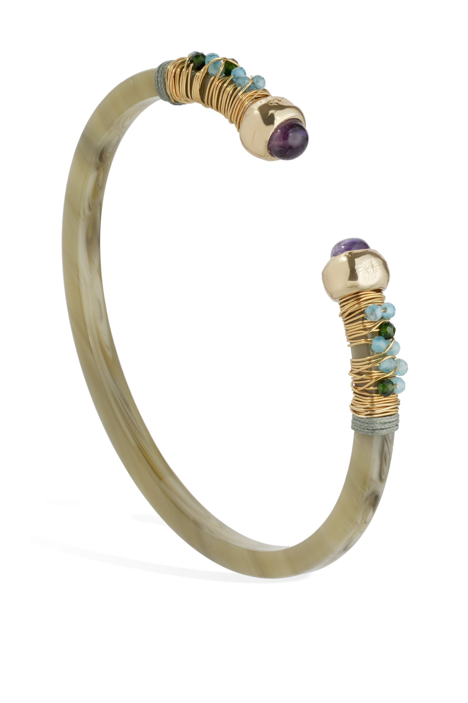 A bracelet with gold-colored metal and blue stones