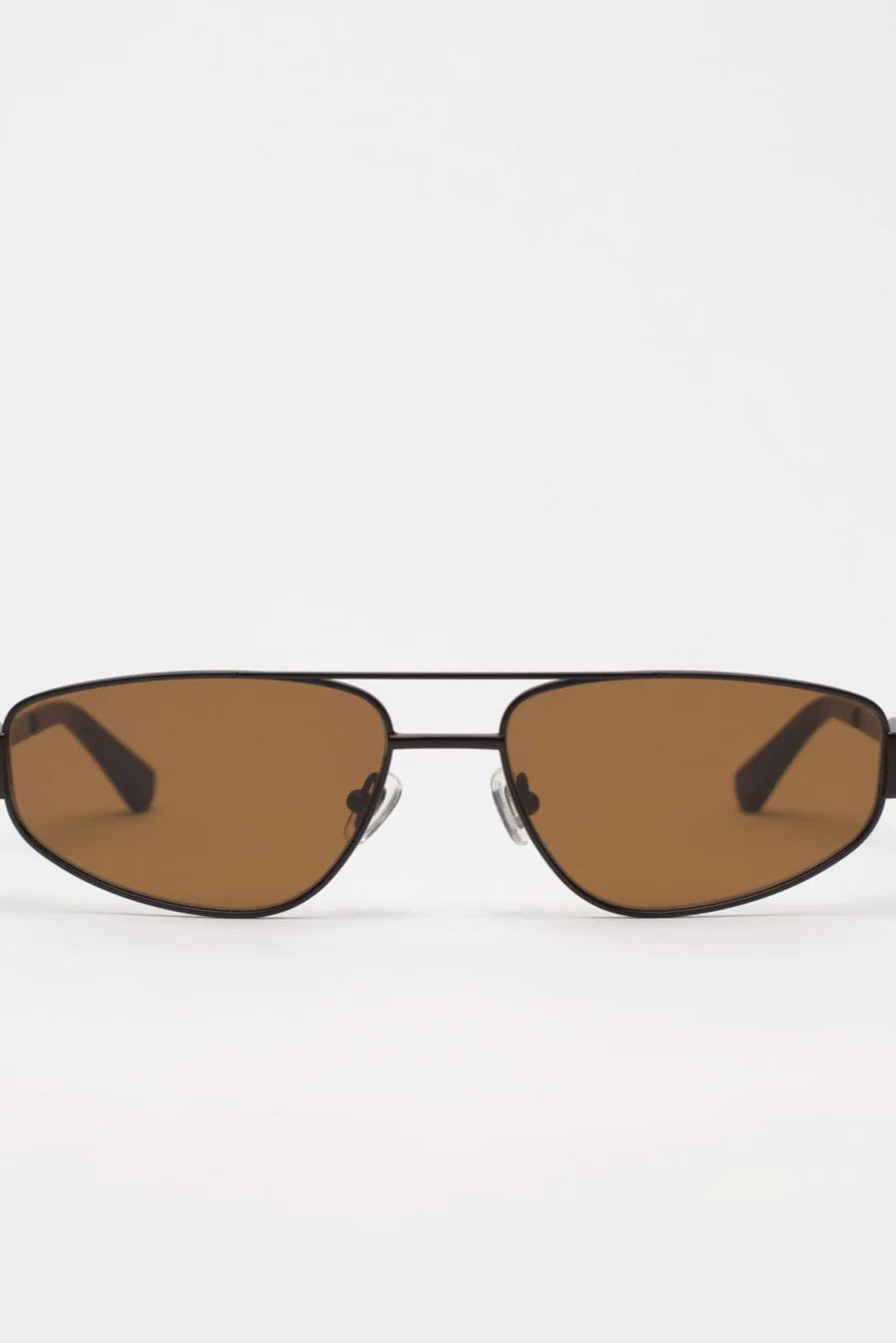 Black sunglasses with brown lenses on a white background