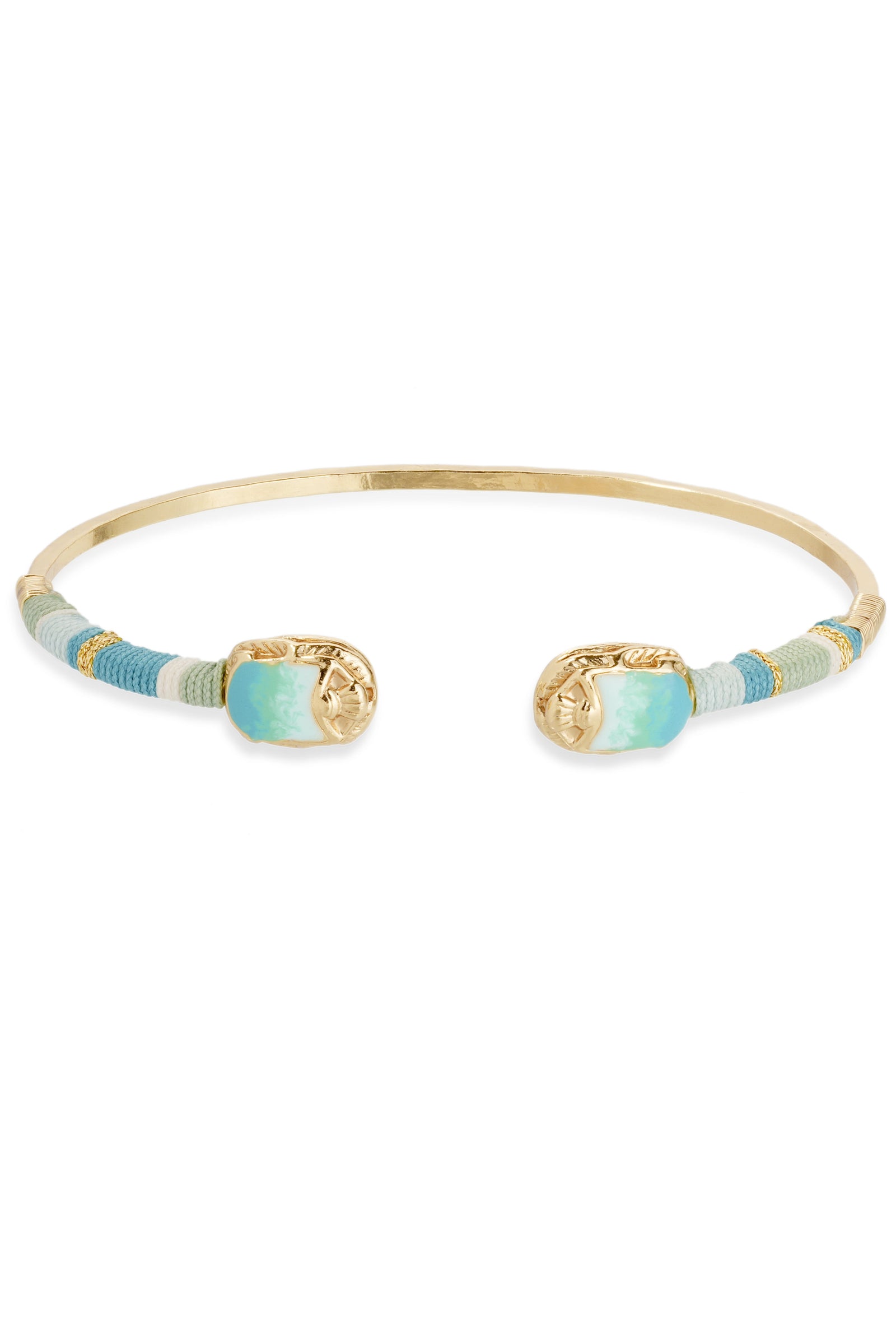 Gold bracelet with blue and green beads on a white background