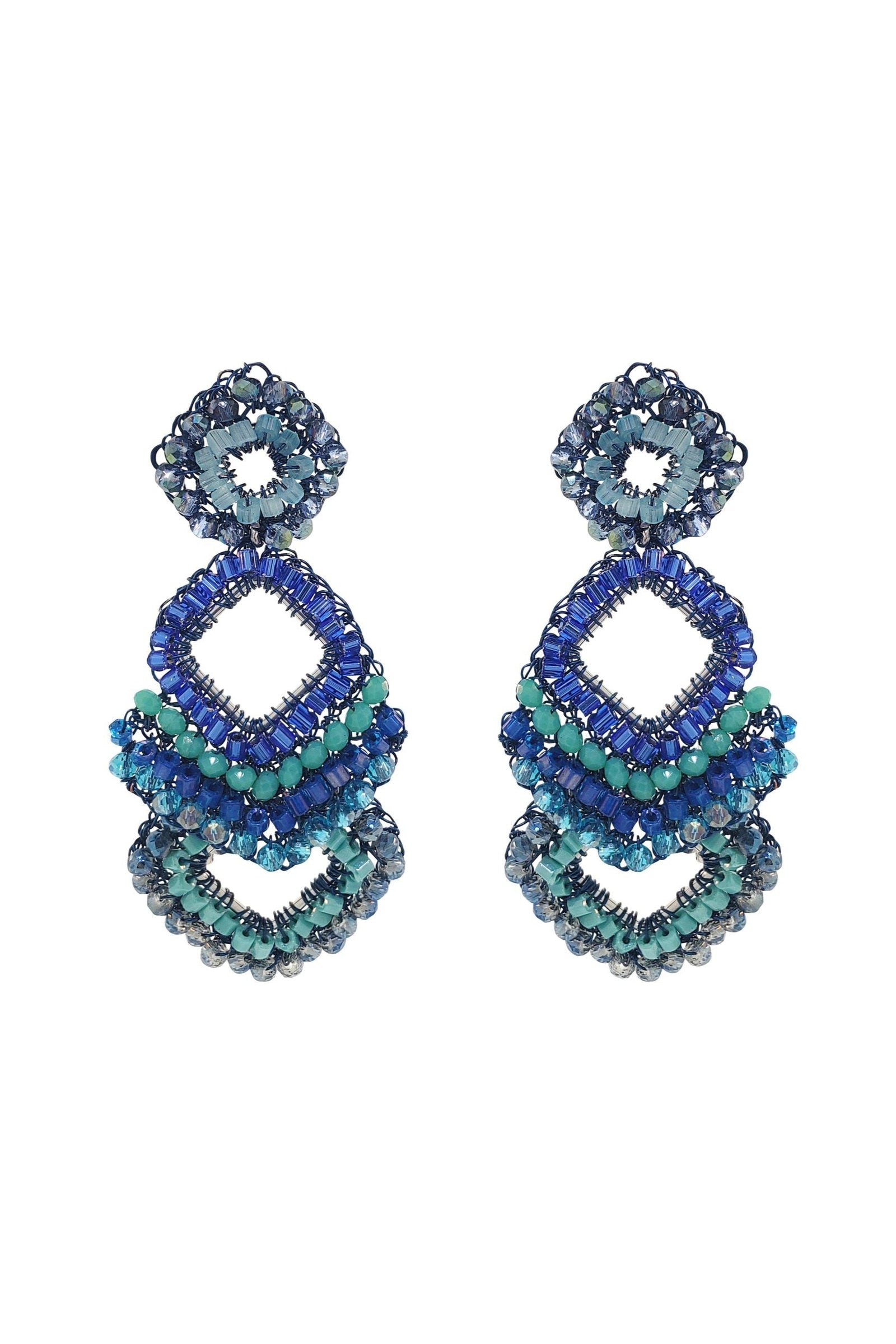 Pair of blue and green beaded earrings on a white background
