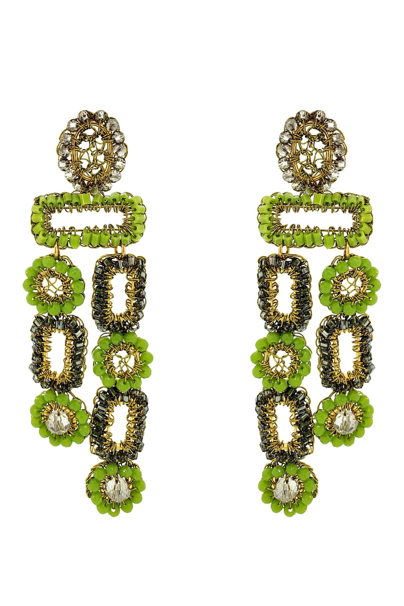 Pair of green and gold earrings on a white background