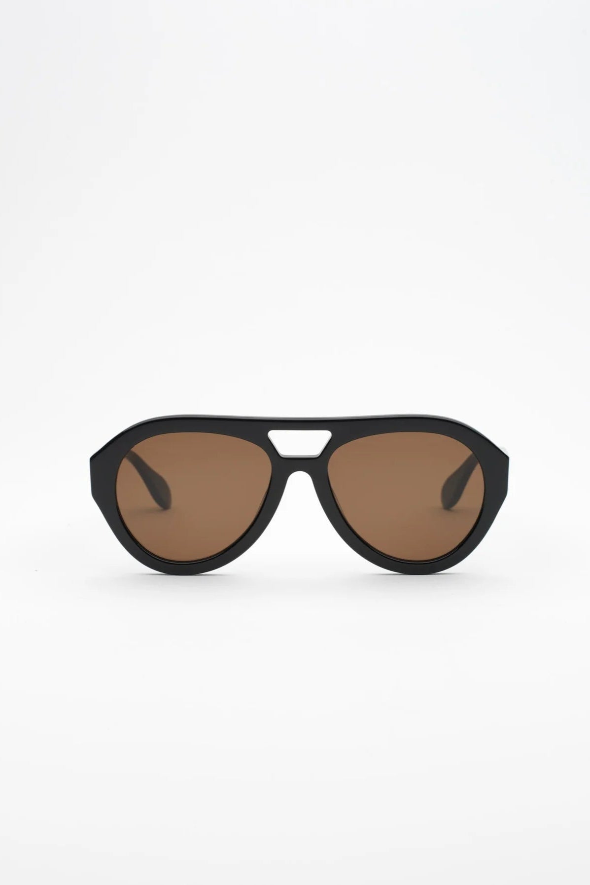 Black sunglasses with brown lenses on a white background